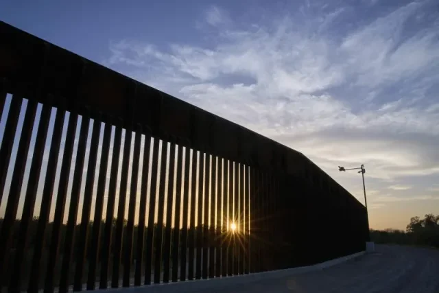 Trump ordered the wall on the border with Mexico to be painted black so that migrants could not climb over it